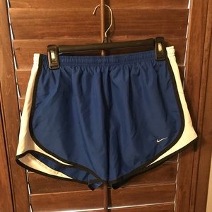 These are a pair of blue nike shorts.